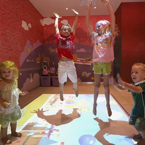 Kids playing interactive game - photo 4